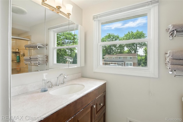 7027 Beverly Crest Dr, West Bloomfield, MI 48322 - bathroom with vanity and a shower with door