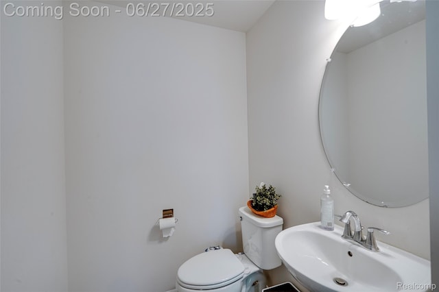 606 Angus Ln, Saline, MI 48176 - half bath with a sink and toilet