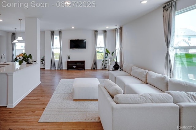 606 Angus Ln, Saline, MI 48176 - living room with plenty of natural light, light wood-type flooring, and recessed lighting