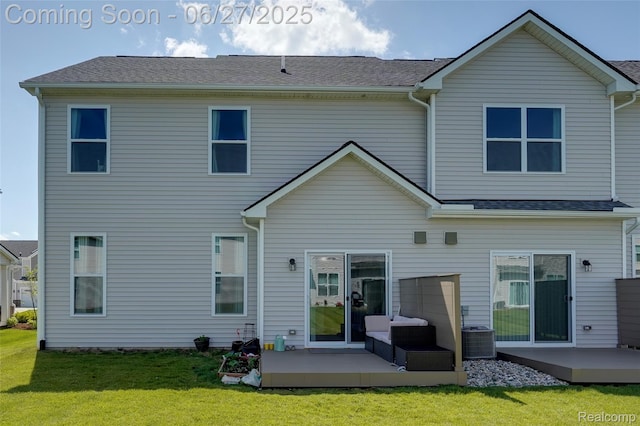 606 Angus Ln, Saline, MI 48176 - back of house featuring a patio and a lawn