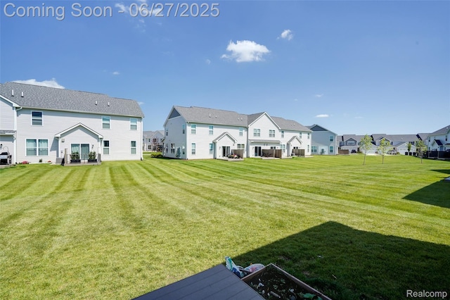 606 Angus Ln, Saline, MI 48176 - view of green lawn featuring a residential view