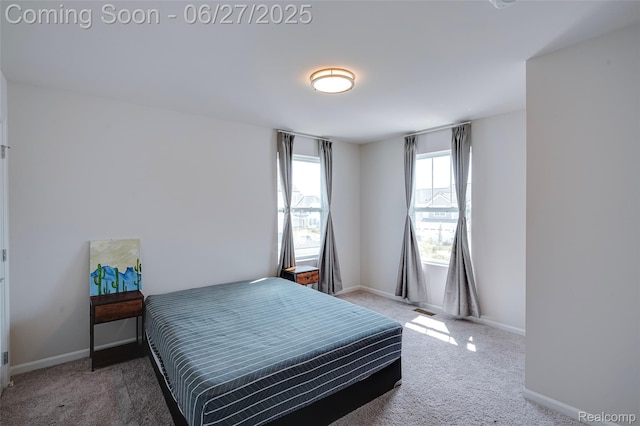 606 Angus Ln, Saline, MI 48176 - carpeted bedroom with baseboards