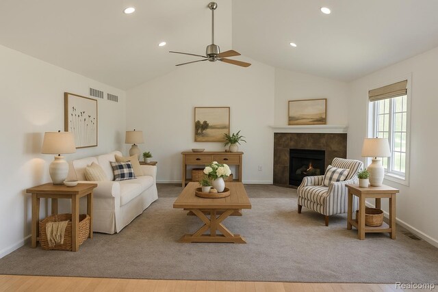 35260 Bradford Dr, New Baltimore, MI 48047 - living room with a fireplace, a ceiling fan, vaulted ceiling, and recessed lighting