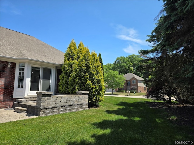 35260 Bradford Dr, New Baltimore, MI 48047 - view of green lawn with entry steps