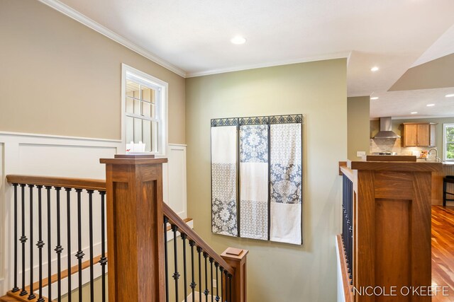 7150 Limerick Ln SW, Byron Center, MI 49315 - corridor with ornamental molding, wainscoting, recessed lighting, a decorative wall, and wood finished floors