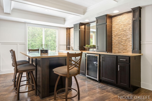 7150 Limerick Ln SW, Byron Center, MI 49315 - indoor bar with beverage cooler, ornamental molding, a decorative wall, dark wood-type flooring, and beam ceiling