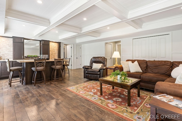 7150 Limerick Ln SW, Byron Center, MI 49315 - living room featuring dark wood-style flooring, coffered ceiling, beam ceiling, ornamental molding, and bar