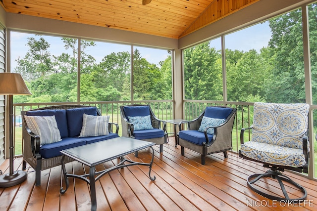 7150 Limerick Ln SW, Byron Center, MI 49315 - sunroom / solarium featuring an outdoor hangout area, lofted ceiling, and view of scattered trees