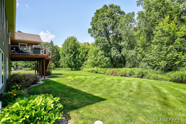 7150 Limerick Ln SW, Byron Center, MI 49315 - view of green lawn with stairs and a deck