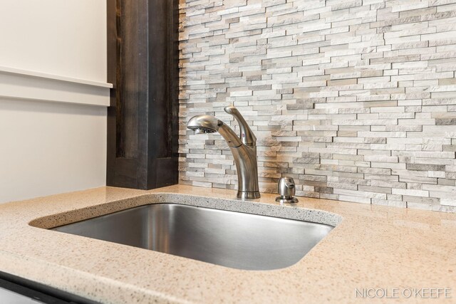 7150 Limerick Ln SW, Byron Center, MI 49315 - kitchen view of tasteful backsplash and light stone countertops