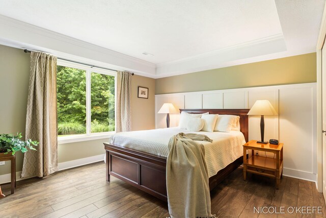 7150 Limerick Ln SW, Byron Center, MI 49315 - bedroom featuring dark wood-style flooring and crown molding