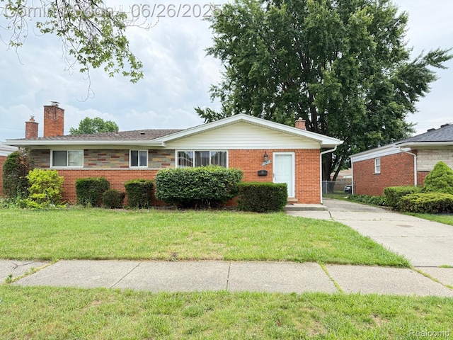 11522 Gerald Dr, Warren, MI 48093 - ranch-style home featuring a chimney, brick siding, and a front lawn