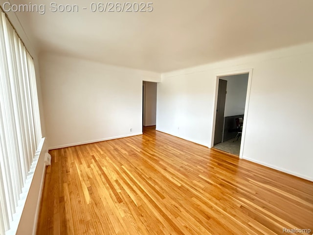 11522 Gerald Dr, Warren, MI 48093 - empty room featuring light wood finished floors and baseboards
