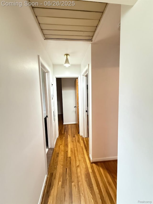 11522 Gerald Dr, Warren, MI 48093 - hallway featuring baseboards and light wood-style flooring