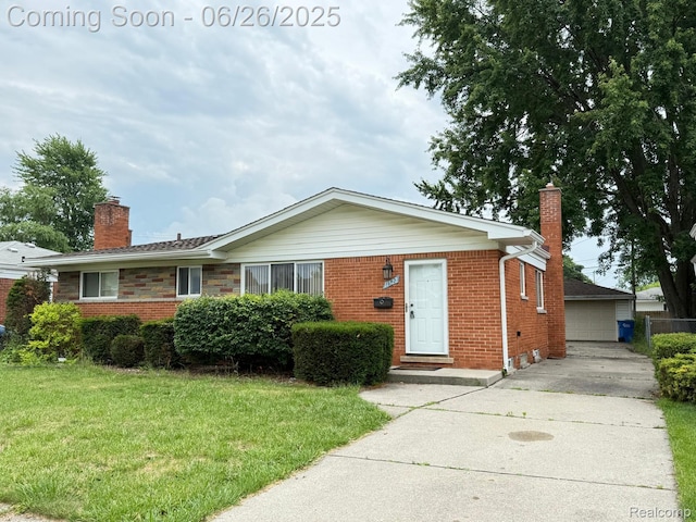 11522 Gerald Dr, Warren, MI 48093 - ranch-style home featuring a chimney, brick siding, a front lawn, and a detached garage