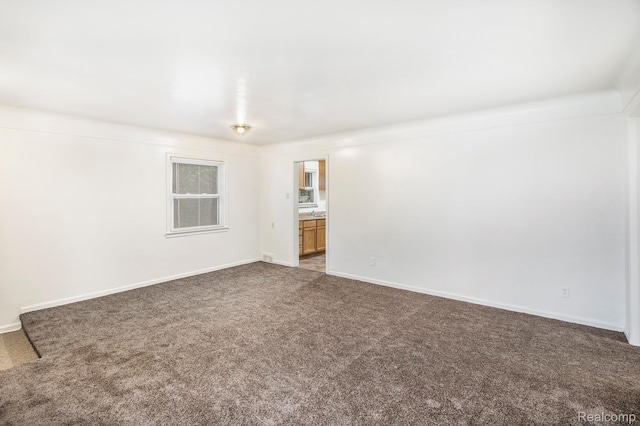 20515 Strathmoor St, Highland Park, MI 48235 - carpeted empty room with baseboards