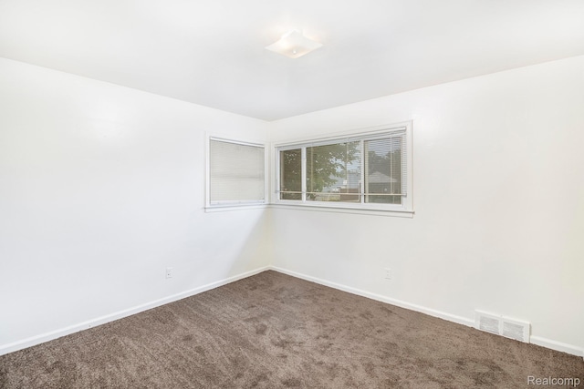 20515 Strathmoor St, Highland Park, MI 48235 - carpeted spare room featuring baseboards