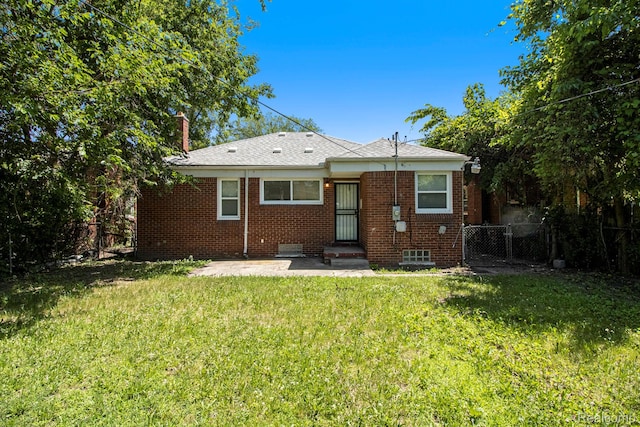 20515 Strathmoor St, Highland Park, MI 48235 - back of house with brick siding and a patio