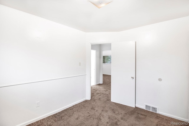 20515 Strathmoor St, Highland Park, MI 48235 - carpeted spare room with baseboards
