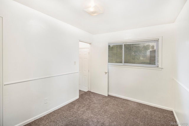 20515 Strathmoor St, Highland Park, MI 48235 - carpeted empty room featuring baseboards