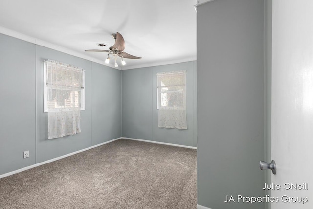 1035 Eastern Ave NE, Grand Rapids, MI 49503 - carpeted spare room with ceiling fan and ornamental molding