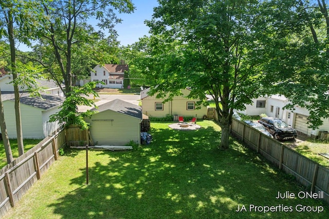 1035 Eastern Ave NE, Grand Rapids, MI 49503 - fenced backyard with a storage shed and a residential view
