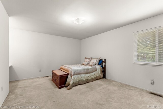 31450 Orchard Brook Ct Unit 8, Farmington Hills, MI 48336 - bedroom featuring carpet and baseboards