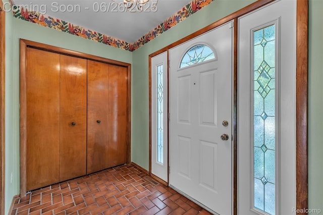 1840 Glen Iris Dr, Commerce Twp, MI 48382 - foyer entrance featuring brick patterned flooring