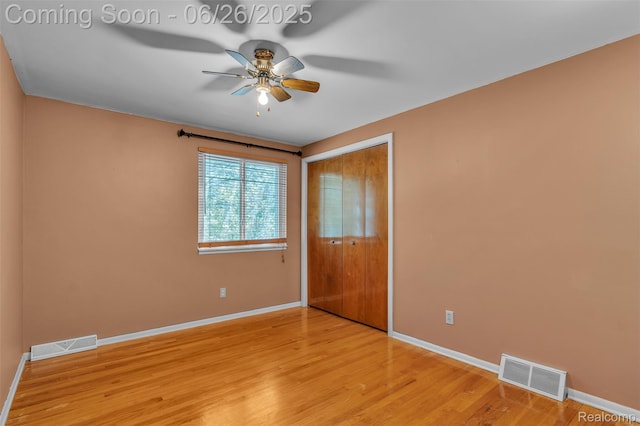 1840 Glen Iris Dr, Commerce Twp, MI 48382 - empty room with a ceiling fan and light wood-type flooring