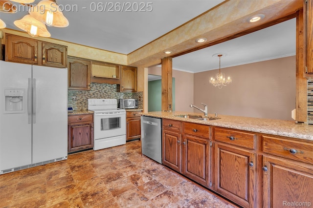 1840 Glen Iris Dr, Commerce Twp, MI 48382 - kitchen with white appliances, brown cabinetry, ornamental molding, a chandelier, and decorative backsplash