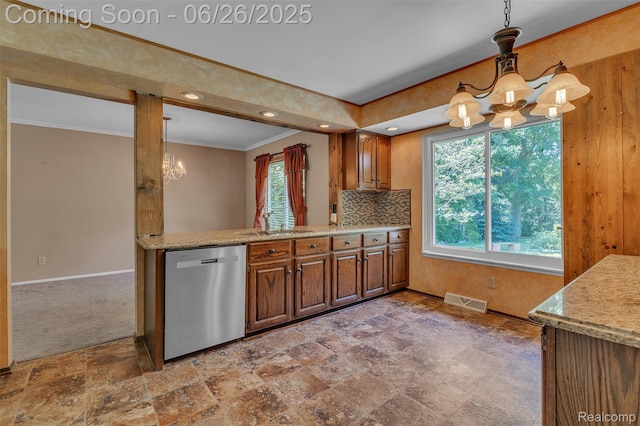 1840 Glen Iris Dr, Commerce Twp, MI 48382 - kitchen with stainless steel dishwasher, a chandelier, ornamental molding, stone finish flooring, and brown cabinetry