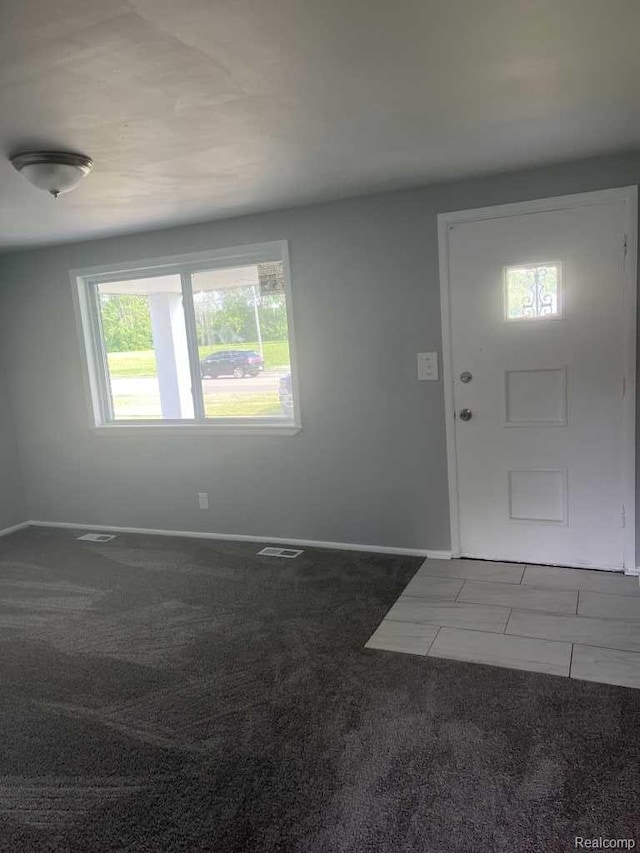 2162 W Coldwater Rd, Flint, MI 48505 - carpeted foyer entrance featuring plenty of natural light