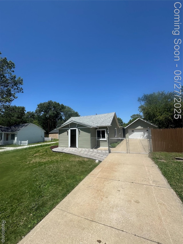 21705 Maxine St, Macomb, MI 48080 - single story home featuring a gate, driveway, and a garage