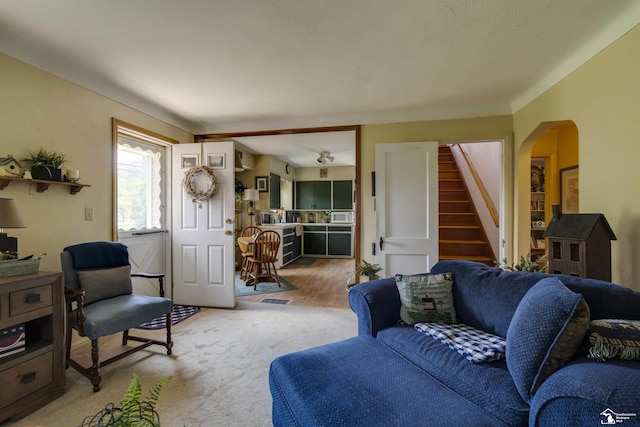 2030 W Sterns Rd, Temperance, MI 48182 - living area featuring stairway and arched walkways
