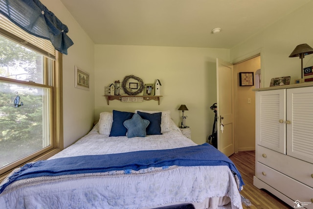 2030 W Sterns Rd, Temperance, MI 48182 - bedroom featuring wood finished floors
