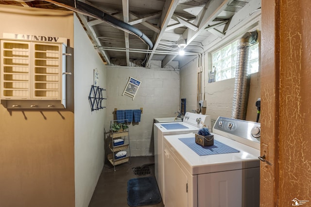 2030 W Sterns Rd, Temperance, MI 48182 - washroom featuring washer and dryer and concrete block wall