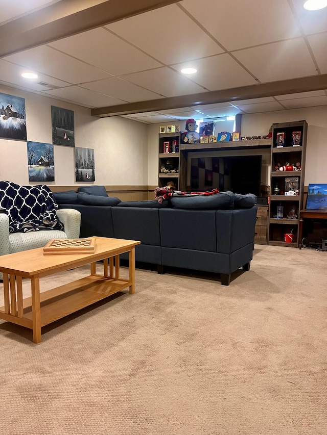 5213 Crocus Ave, Lansing, MI 48911 - living area featuring carpet flooring, a paneled ceiling, and wainscoting
