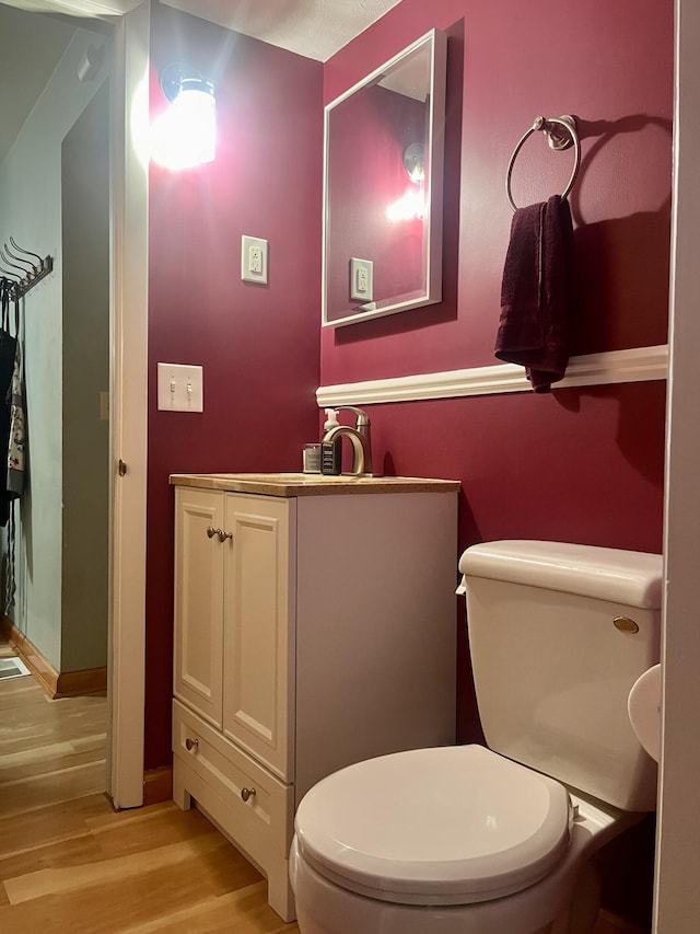 5213 Crocus Ave, Lansing, MI 48911 - bathroom with wood finished floors and vanity