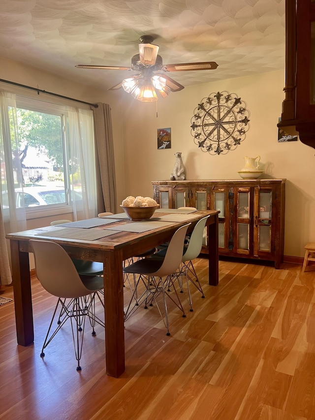 5213 Crocus Ave, Lansing, MI 48911 - dining room with light wood-style floors and a ceiling fan