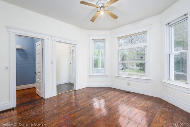 28604 Grayling Ave, Farmington Hills, MI 48336 - unfurnished room featuring dark wood-style floors and ceiling fan