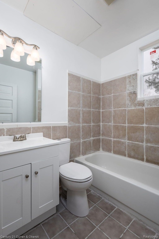 28604 Grayling Ave, Farmington Hills, MI 48336 - full bath with tile walls, vanity, tile patterned floors, and a wainscoted wall