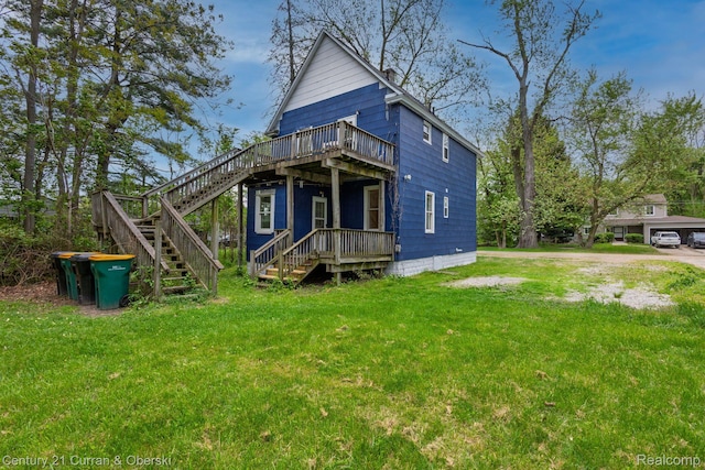 28604 Grayling Ave, Farmington Hills, MI 48336 - view of front of property with stairs, a front yard, and a deck