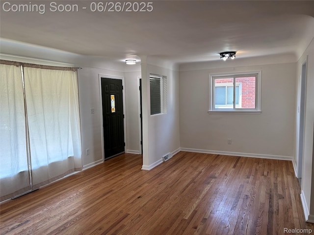 8816 Salem Ln, Redford, MI 48239 - spare room featuring wood finished floors and baseboards