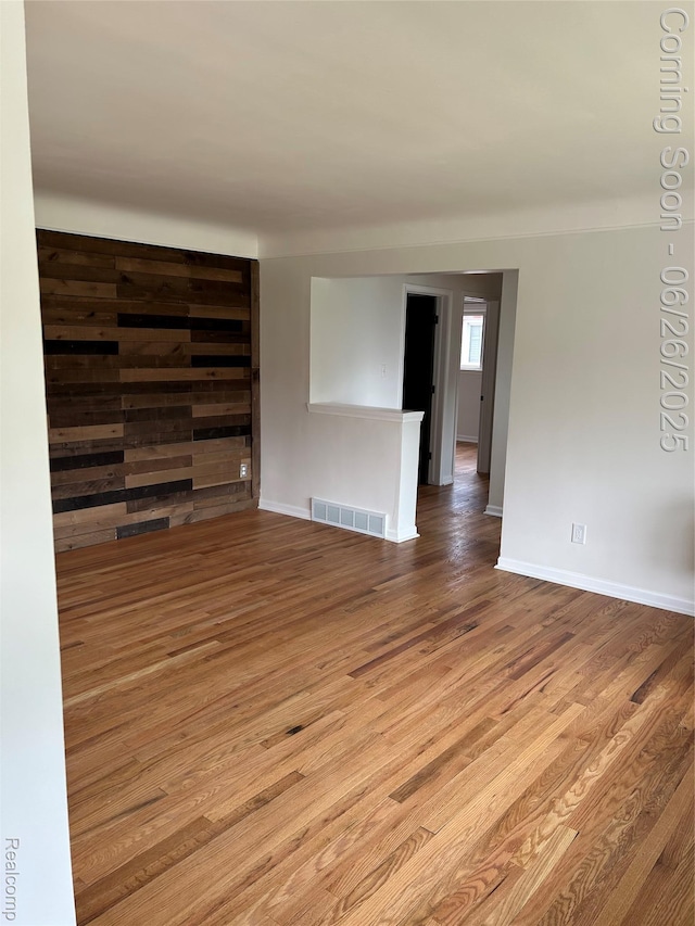 8816 Salem Ln, Redford, MI 48239 - spare room with wood finished floors and baseboards