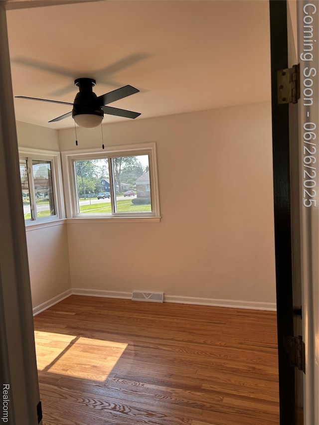 8816 Salem Ln, Redford, MI 48239 - spare room with wood finished floors and ceiling fan