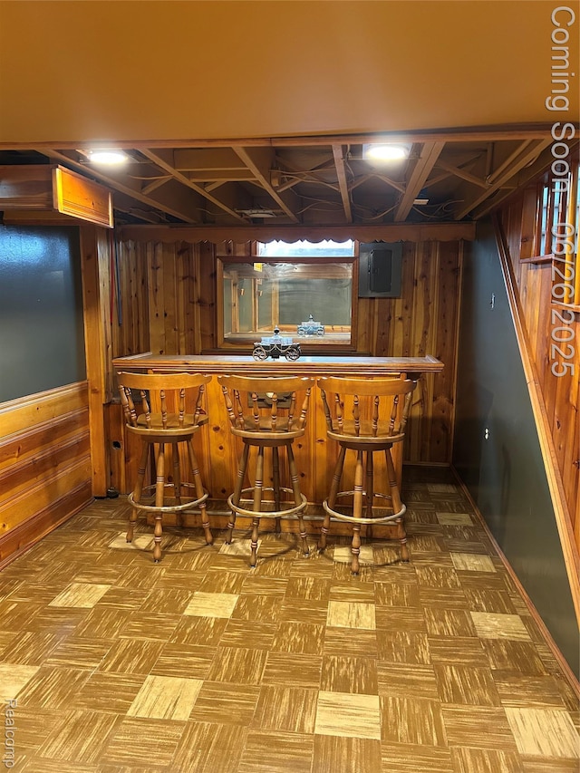 8816 Salem Ln, Redford, MI 48239 - indoor dry bar featuring wooden walls and electric panel