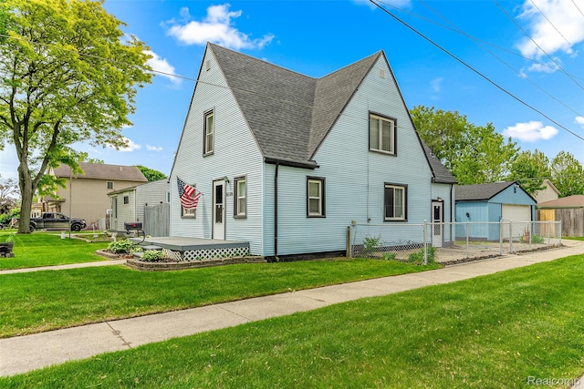8329 Lenore St, Dearborn Heights, MI 48127 - view of front of property featuring a shingled roof and an outdoor structure