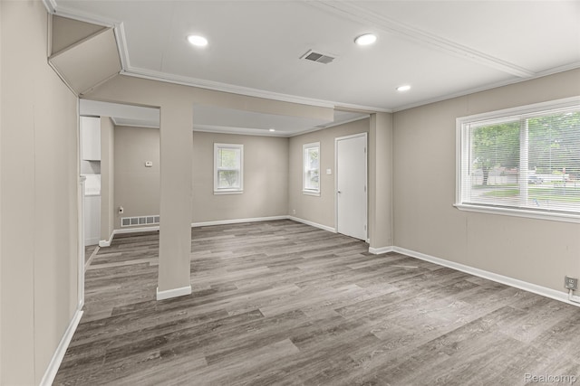8329 Lenore St, Dearborn Heights, MI 48127 - spare room featuring wood finished floors, crown molding, and recessed lighting