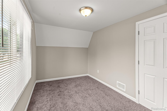 8329 Lenore St, Dearborn Heights, MI 48127 - additional living space with carpet flooring and lofted ceiling