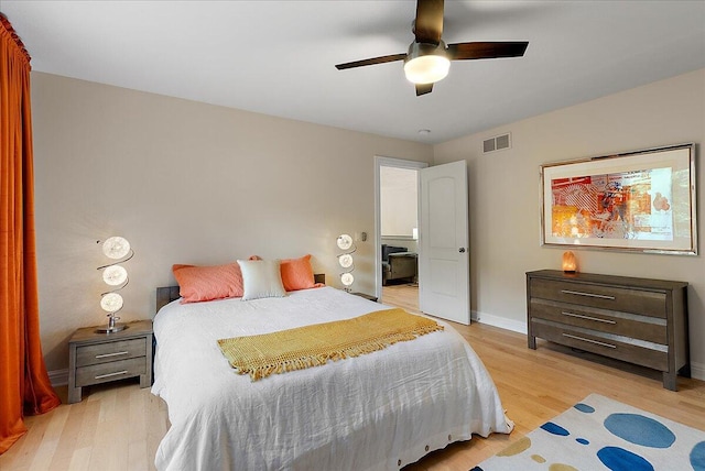 4608 Old Grand River Trl NE, Ada, MI 49301 - bedroom featuring light wood-style floors and a ceiling fan